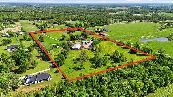 20 Acres of Agricultural Land with Home for Sale in Gravette, Arkansas