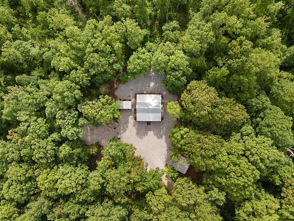9.46 Acres of Land with Home for Sale in Hurricane Mills, Tennessee