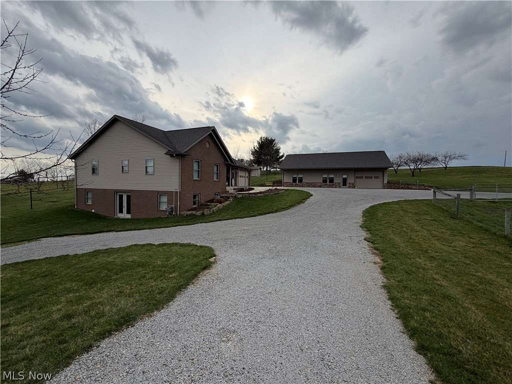 6.1 Acres of Land with Home for Auction in Millersburg, Ohio