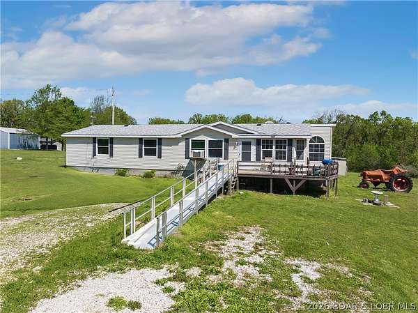 3.1 Acres of Land with Home for Sale in Linn Creek, Missouri