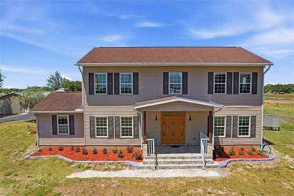 6.58 Acres of Land with Home for Sale in Parrish, Florida