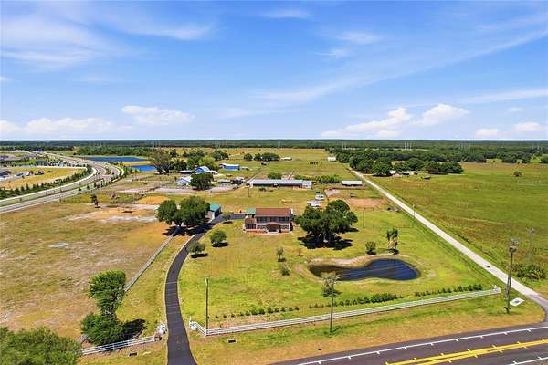 6.58 Acres of Land with Home for Sale in Parrish, Florida