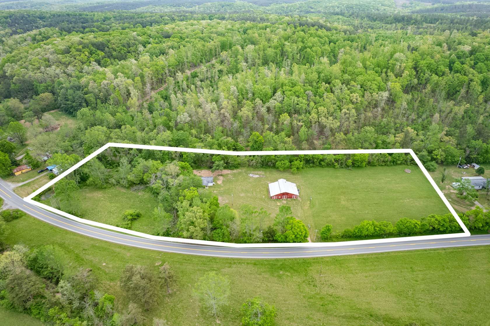 5.74 Acres of Land with Home for Sale in Centerville, Tennessee