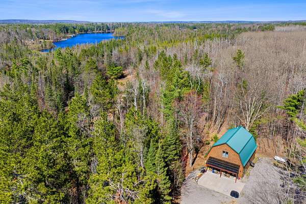 10 Acres of Recreational Land with Home for Sale in Atlanta, Michigan