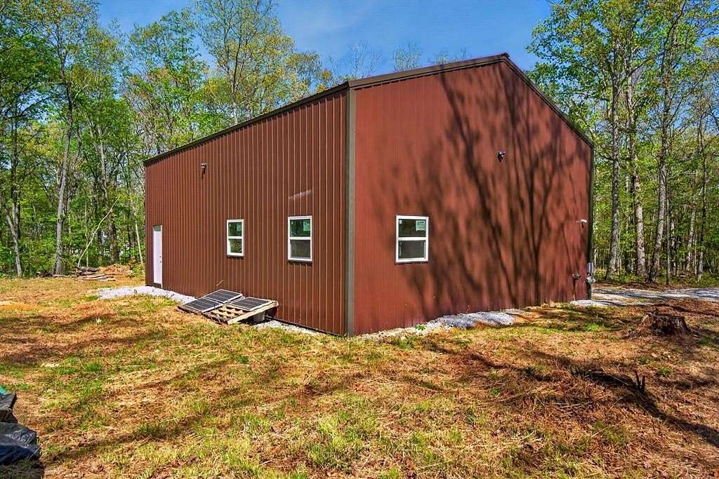 14.7 Acres of Land with Home for Sale in Pikeville, Tennessee