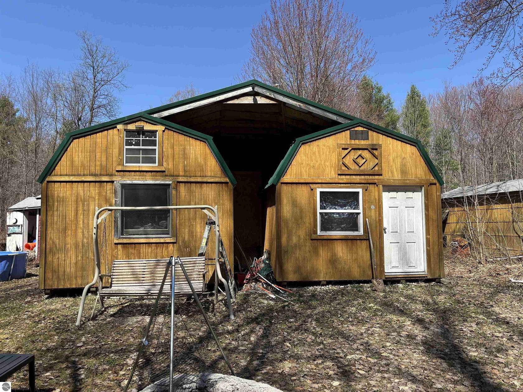 10 Acres of Recreational Land with Home for Sale in Elmira, Michigan