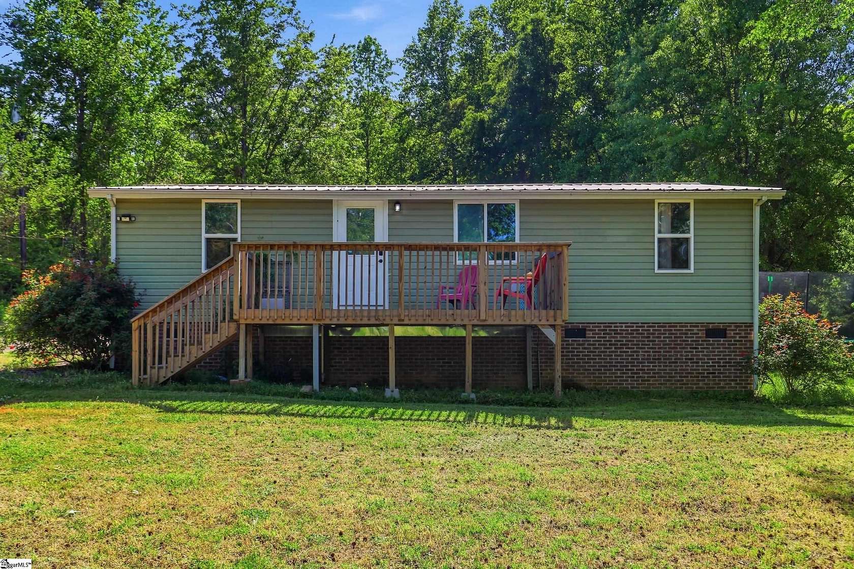 1.5 Acres of Land with Home for Sale in Fountain Inn, South Carolina