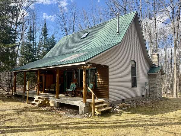 10 Acres of Recreational Land with Home for Sale in Barton City, Michigan