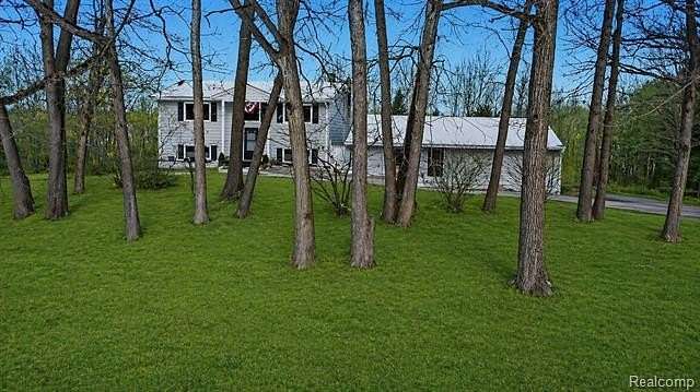 2 Acres of Land with Home for Sale in Addison Township, Michigan