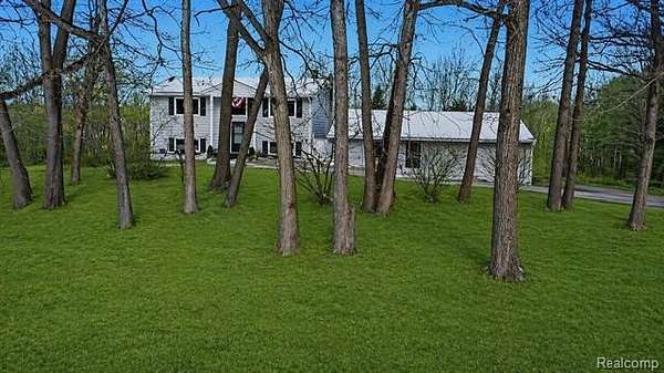 2 Acres of Land with Home for Sale in Addison Township, Michigan