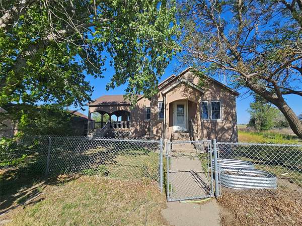 6.6 Acres of Land with Home for Sale in Dodge City, Kansas