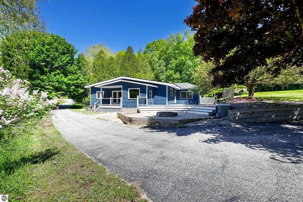 5 Acres of Land with Home for Sale in Frankfort, Michigan