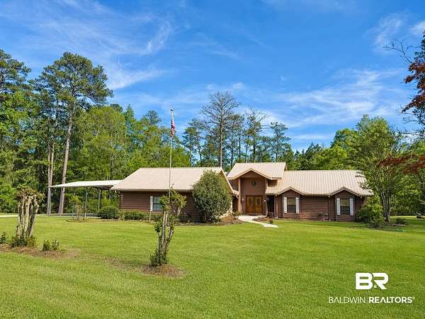 4.49 Acres of Land with Home for Sale in Castleberry, Alabama