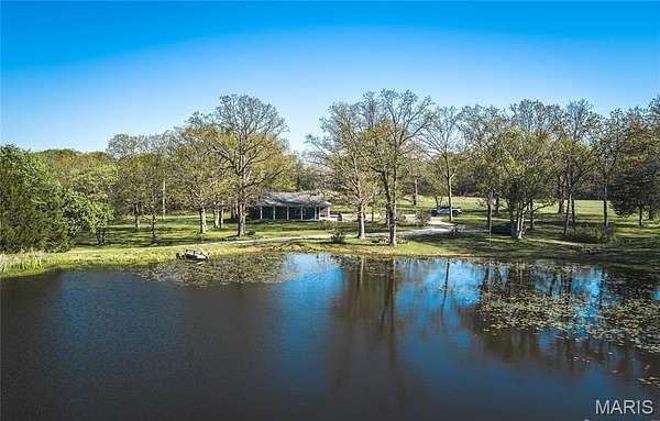 25.6 Acres of Land with Home for Sale in Belle, Missouri