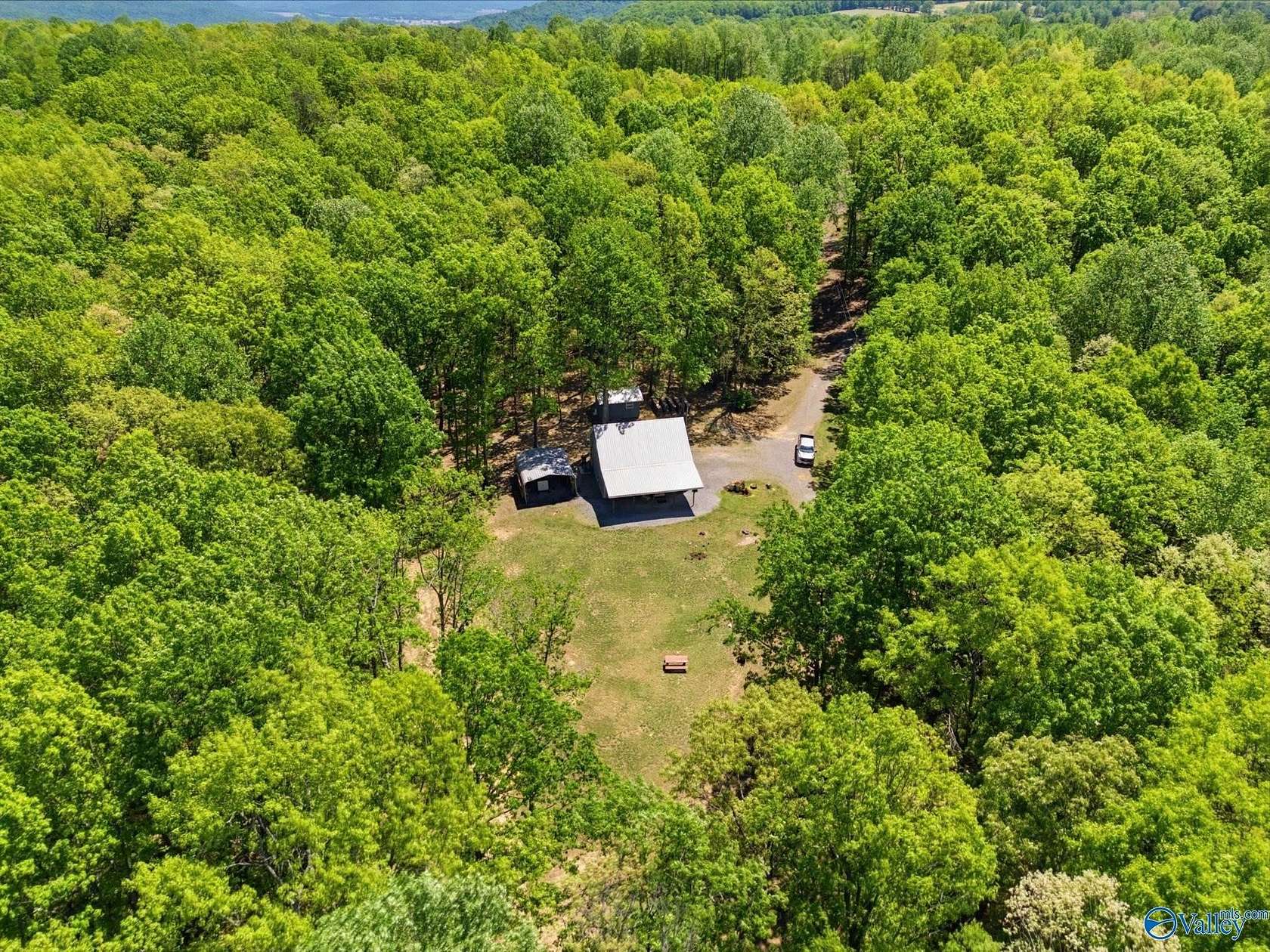 43 Acres of Recreational Land with Home for Sale in Scottsboro, Alabama