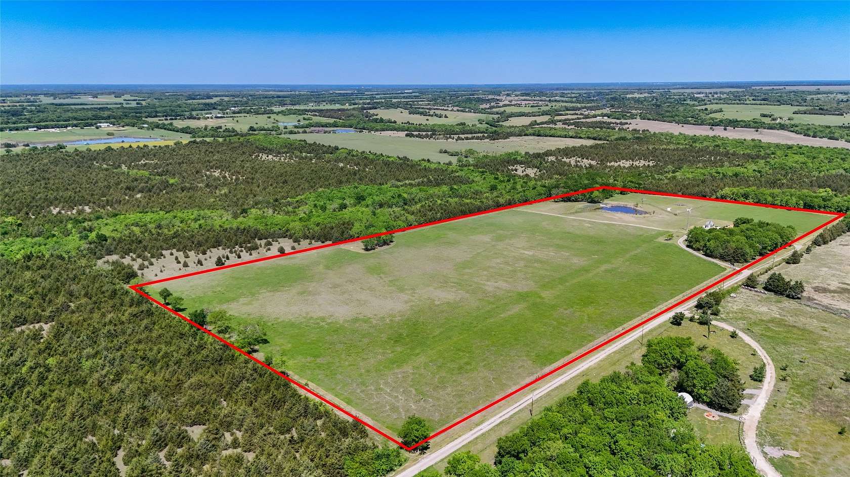 29.3 Acres of Land with Home for Sale in Wolfe City, Texas