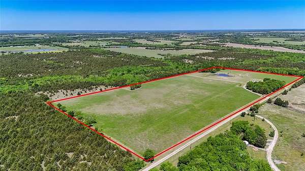 29.3 Acres of Land with Home for Sale in Wolfe City, Texas
