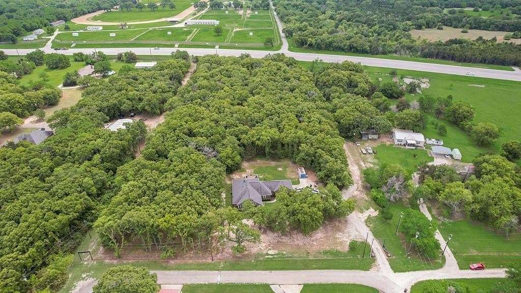 4 Acres of Land with Home for Sale in Quinlan, Texas