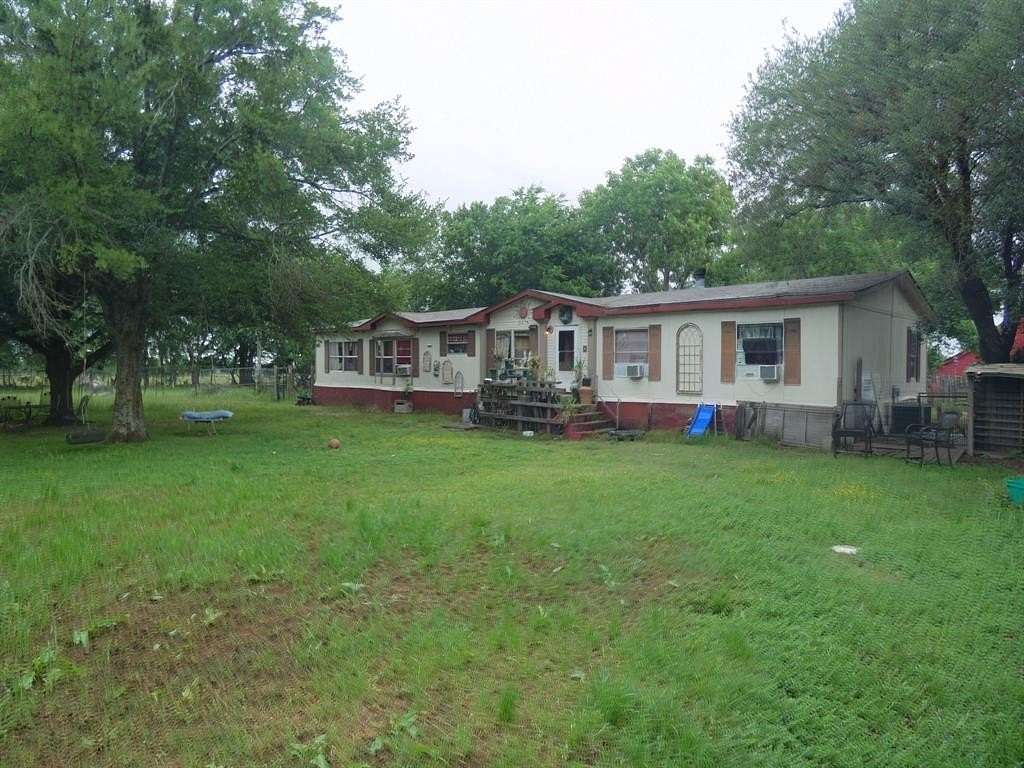 8.8 Acres of Land with Home for Sale in Quinlan, Texas