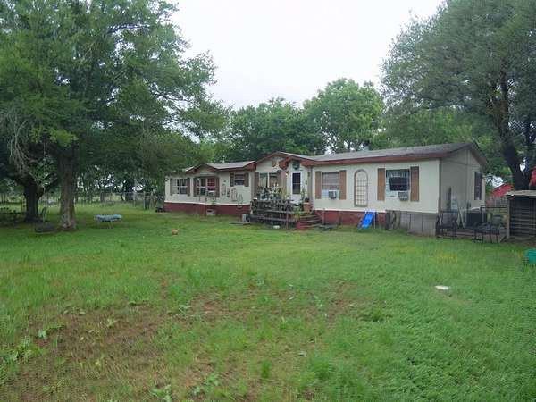 8.8 Acres of Land with Home for Sale in Quinlan, Texas