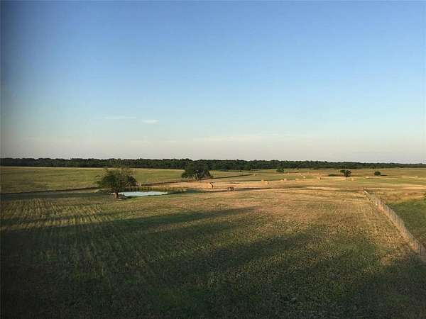 77 Acres of Agricultural & Residential Land for Sale in Wolfe City, Texas