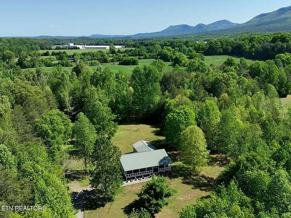 6.5 Acres of Land with Home for Sale in Benton, Tennessee