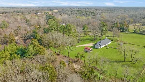 5.5 Acres of Land with Home for Sale in Paris, Texas