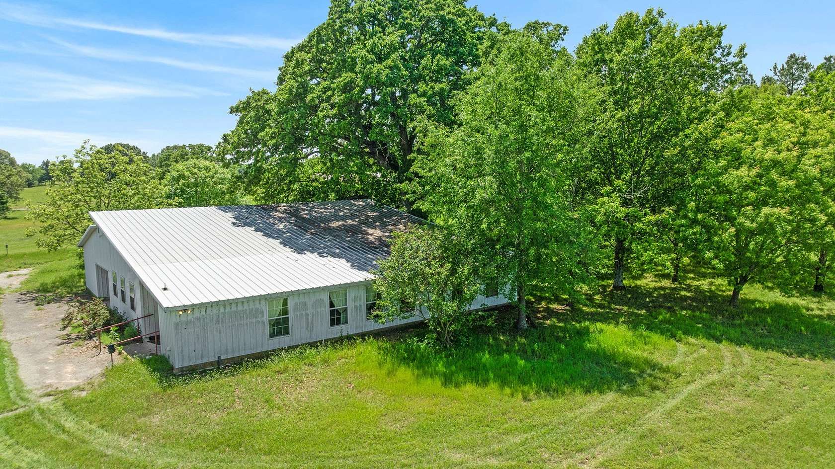 53.9 Acres of Land with Home for Sale in Honey Grove, Texas