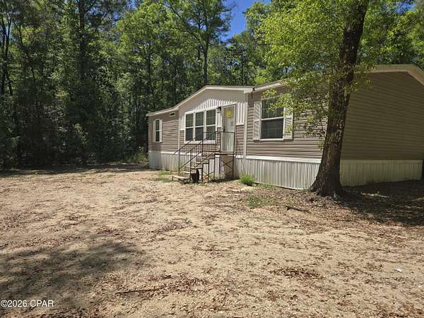 3.33 Acres of Land with Home for Sale in Ponce de Leon, Florida