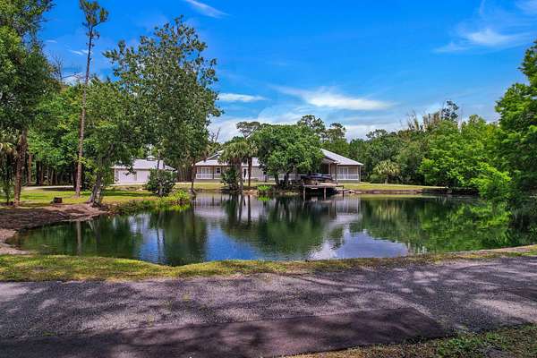 4.7 Acres of Land with Home for Sale in Palm City, Florida