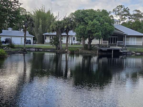 4.7 Acres of Land with Home for Sale in Palm City, Florida
