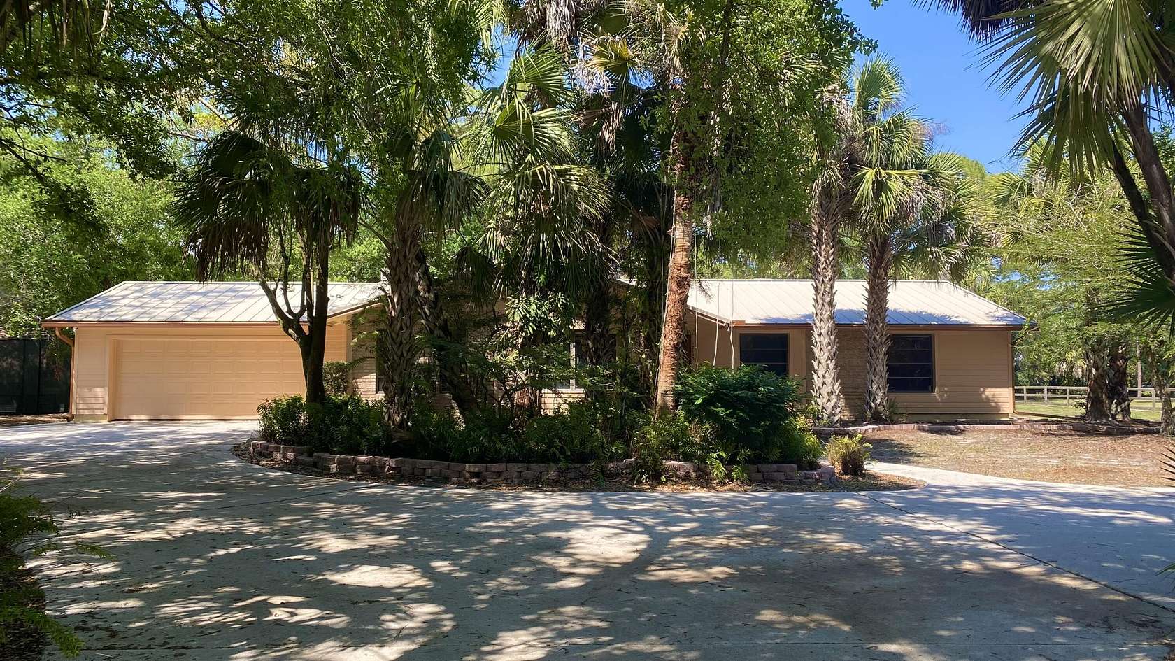 1.5 Acres of Land with Home for Sale in Jupiter, Florida