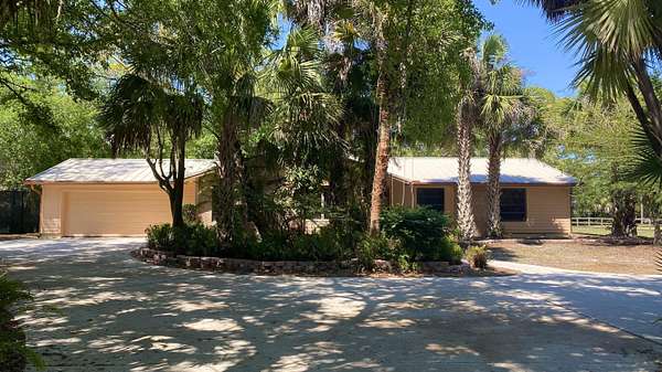 1.5 Acres of Land with Home for Sale in Jupiter, Florida