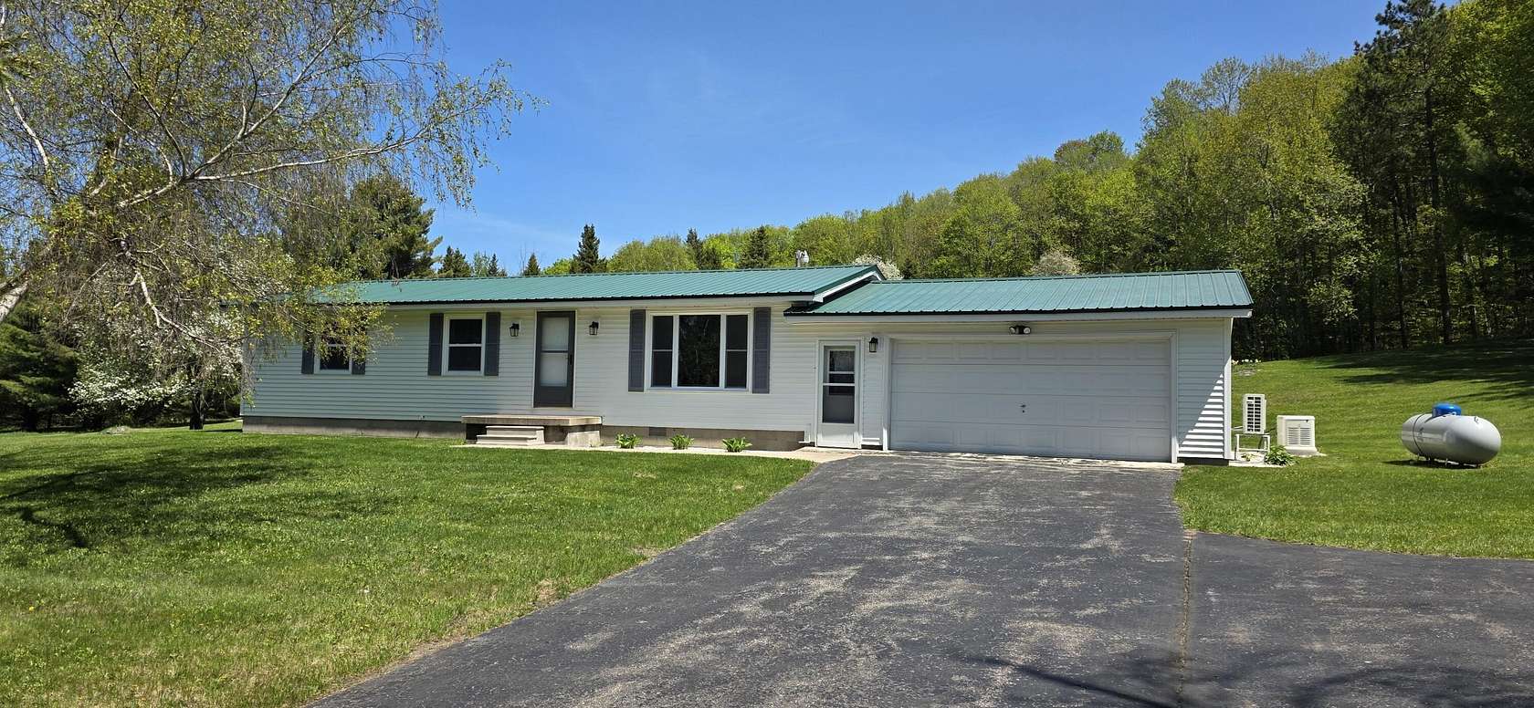 20 Acres of Recreational Land with Home for Sale in Hessel, Michigan