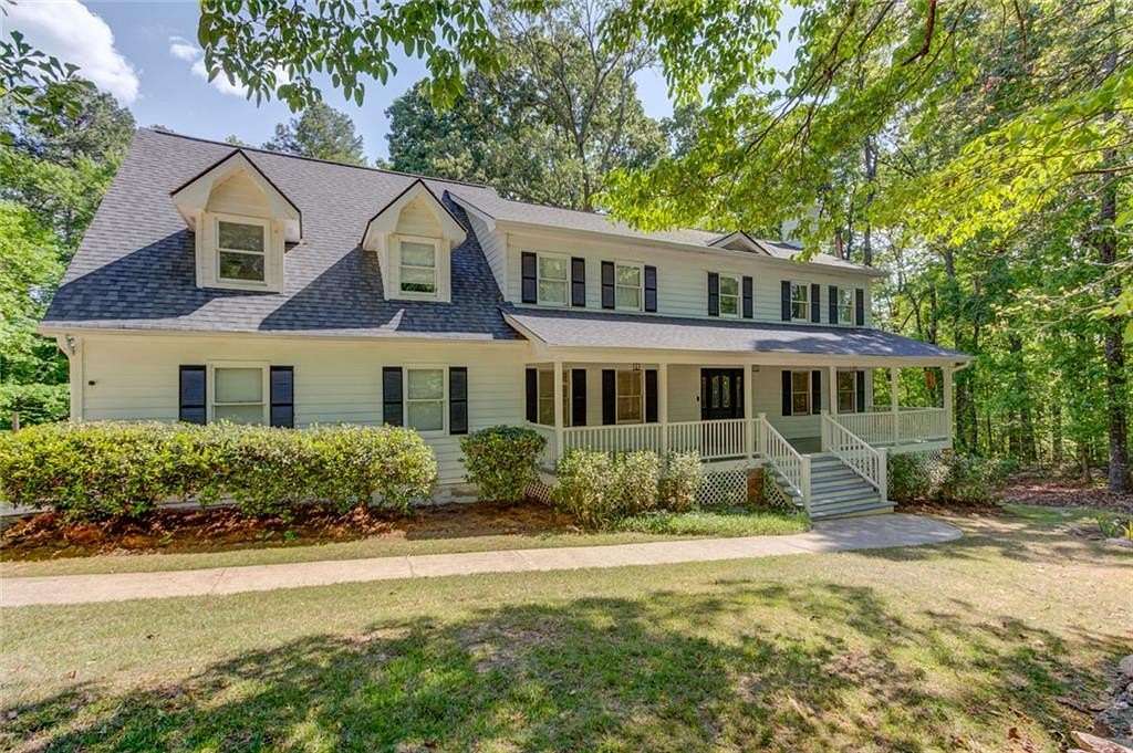 6.2 Acres of Land with Home for Sale in Sugar Hill, Georgia