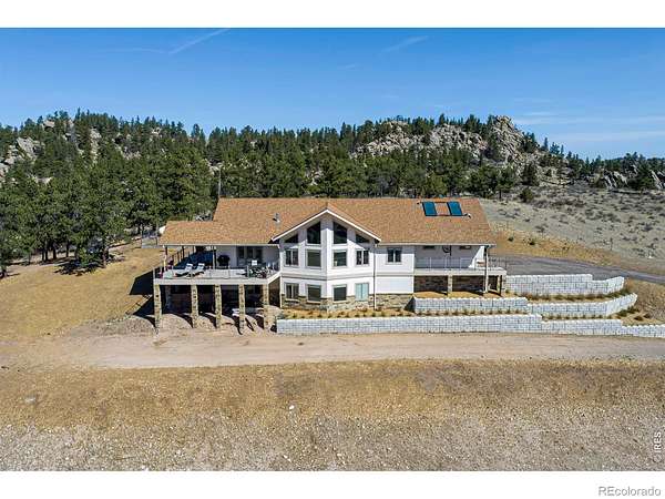 10.6 Acres of Land with Home for Sale in Livermore, Colorado