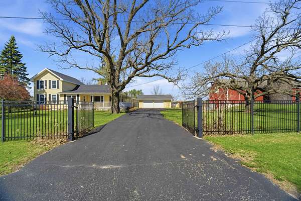 25.4 Acres of Agricultural Land with Home for Sale in New London, Wisconsin