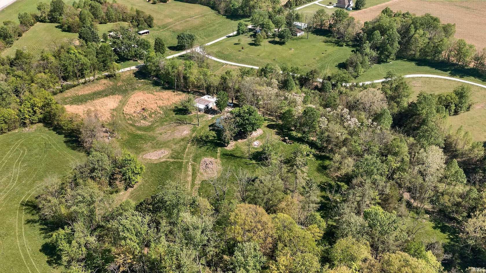 14.3 Acres of Land with Home for Sale in Bedford, Indiana