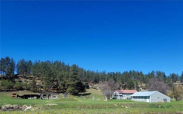 100 Acres of Agricultural Land with Home for Sale in Roundup, Montana