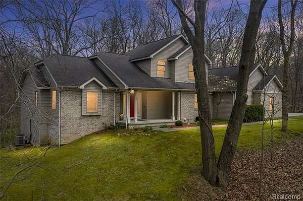 2.85 Acres of Land with Home for Sale in Groveland Township, Michigan