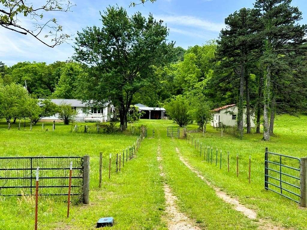 5.6 Acres of Land with Home for Sale in Marshall, Arkansas
