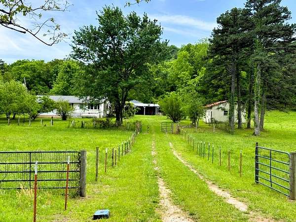 5.6 Acres of Land with Home for Sale in Marshall, Arkansas