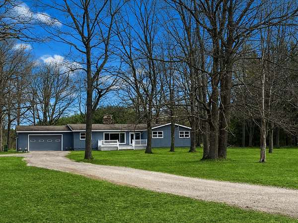 2 Acres of Land with Home for Sale in Cadillac, Michigan