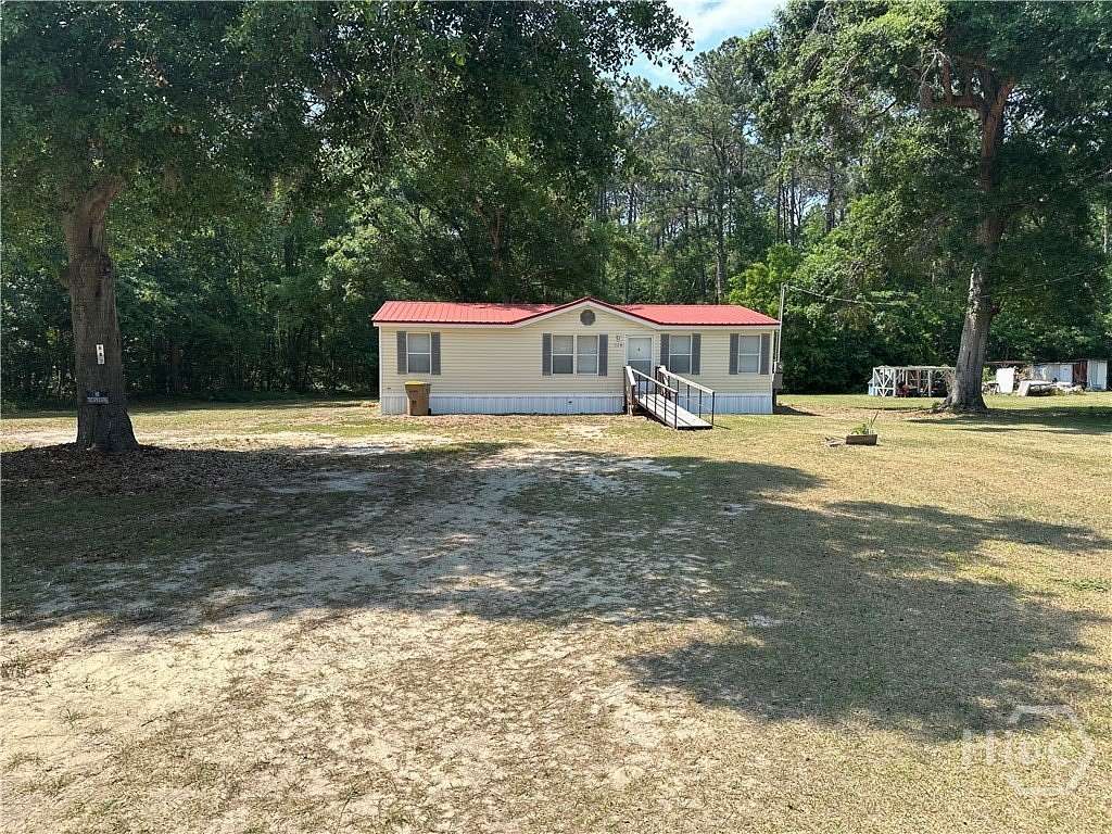 2.63 Acres of Land with Home for Sale in Bloomingdale, Georgia