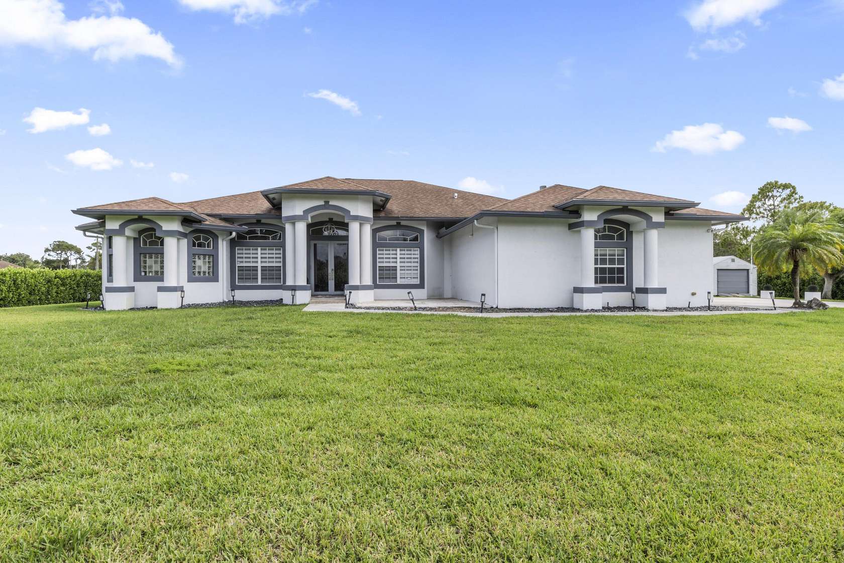 1.54 Acres of Land with Home for Sale in The Acreage, Florida