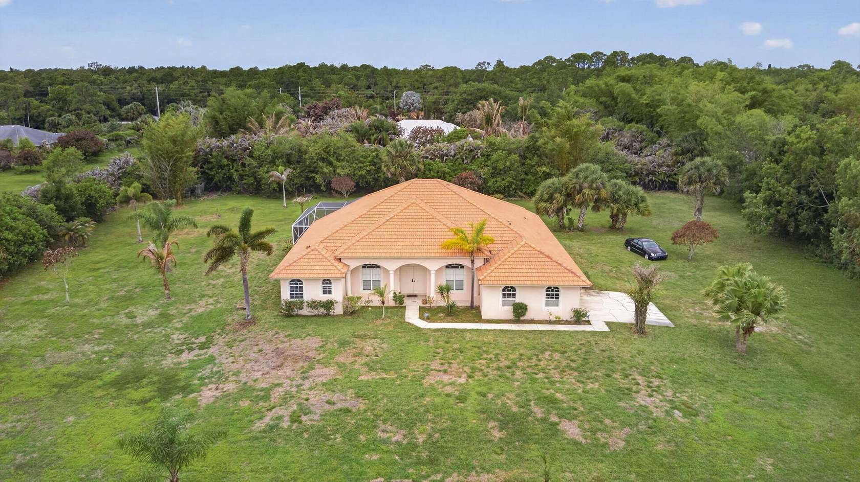 1.5 Acres of Land with Home for Sale in Jupiter, Florida