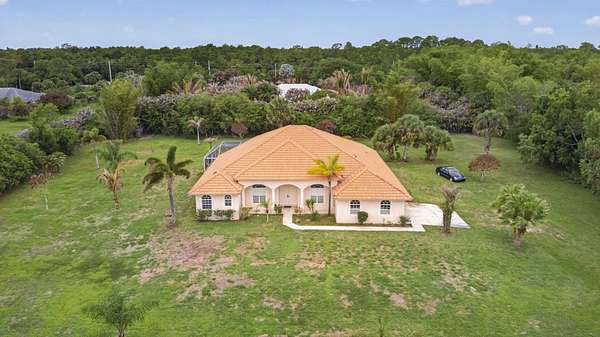 1.5 Acres of Land with Home for Sale in Jupiter, Florida