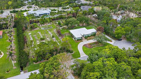 2.5 Acres of Land with Home for Sale in Jupiter, Florida