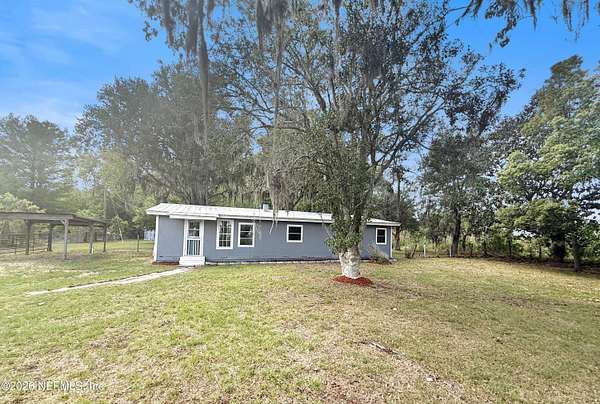 1.6 Acres of Land with Home for Sale in Starke, Florida