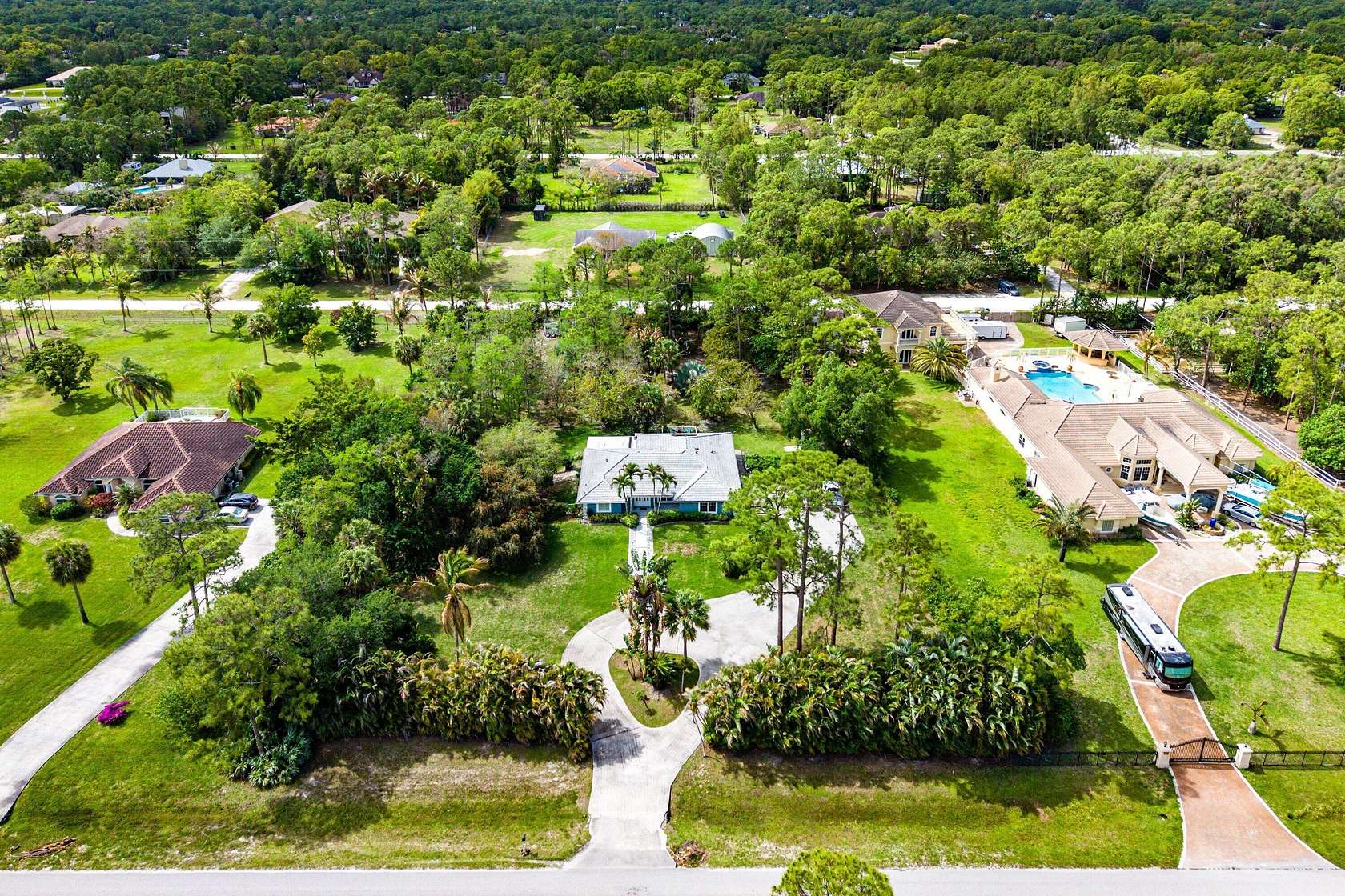 1.86 Acres of Land with Home for Sale in Loxahatchee Groves, Florida